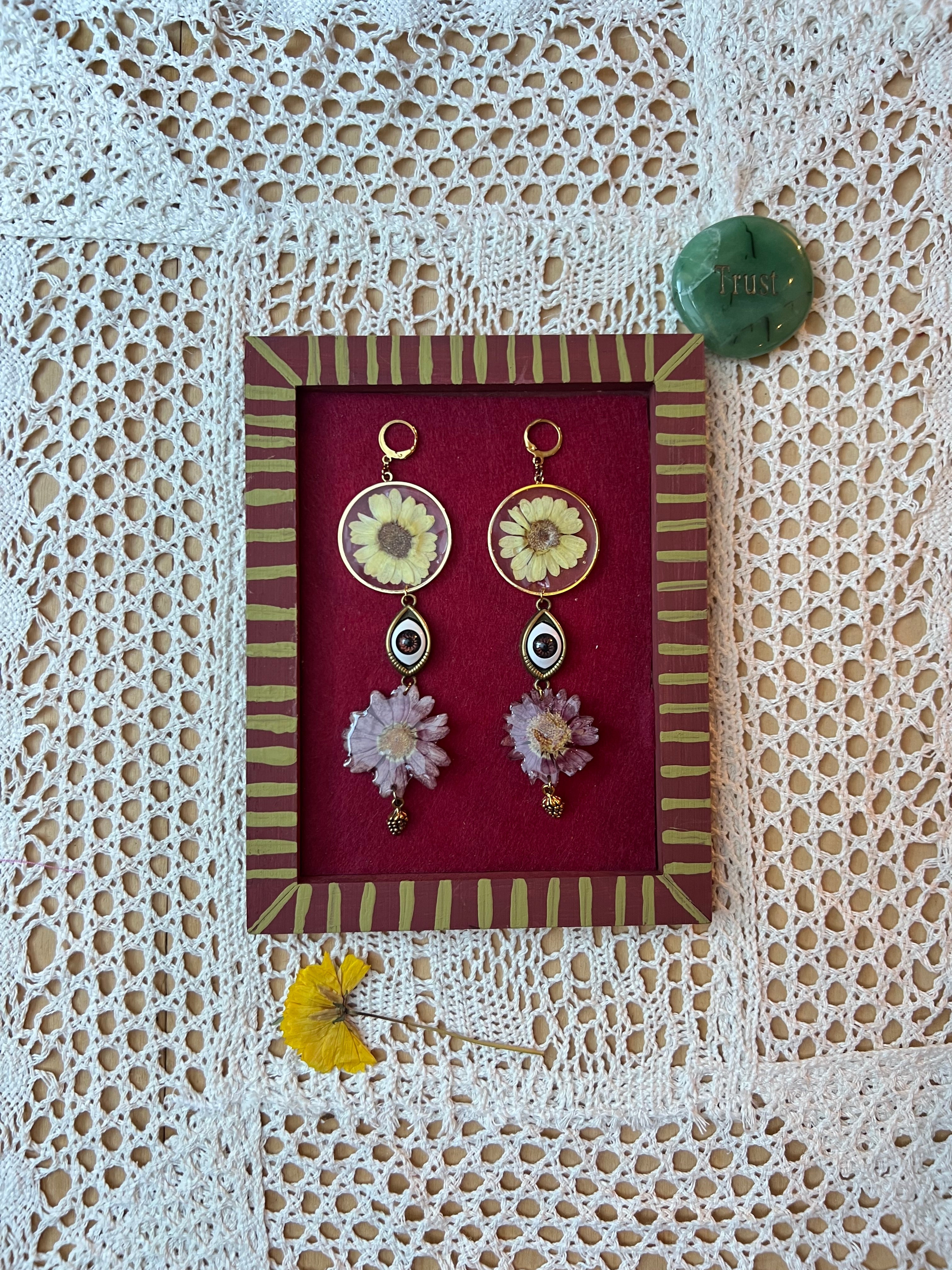 dangle Flower Stack earring featuring a protective eye
