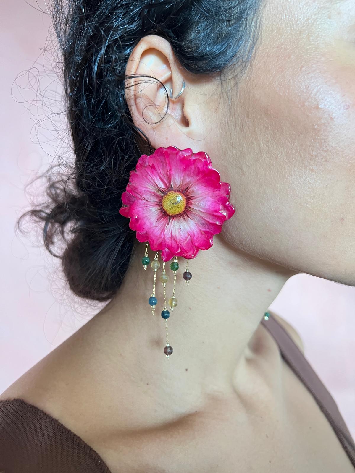 White daisy with half length dangle threads with beads