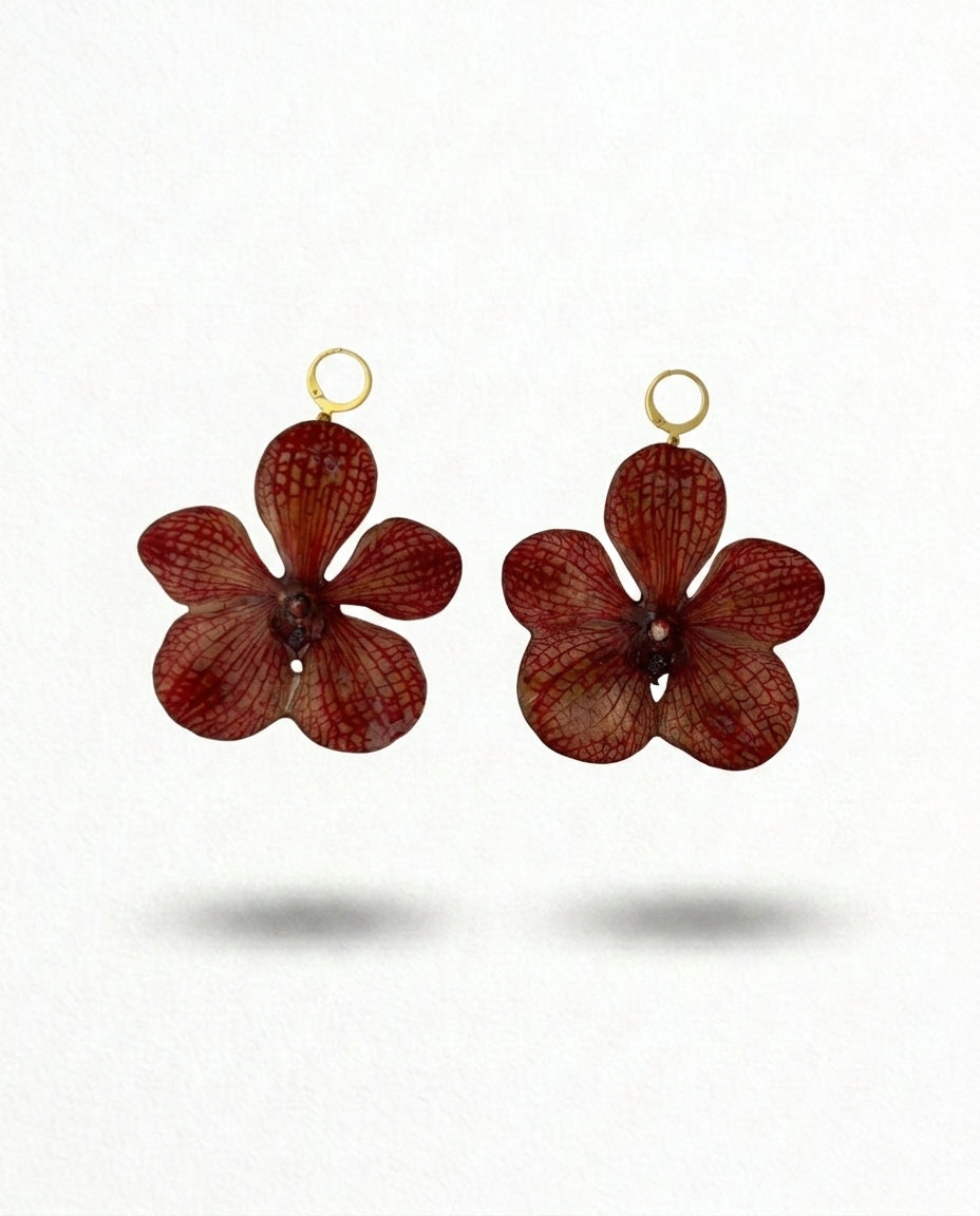 Dark red dangling ORCHID earrings.