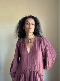 Purple orchid on mustard choker.