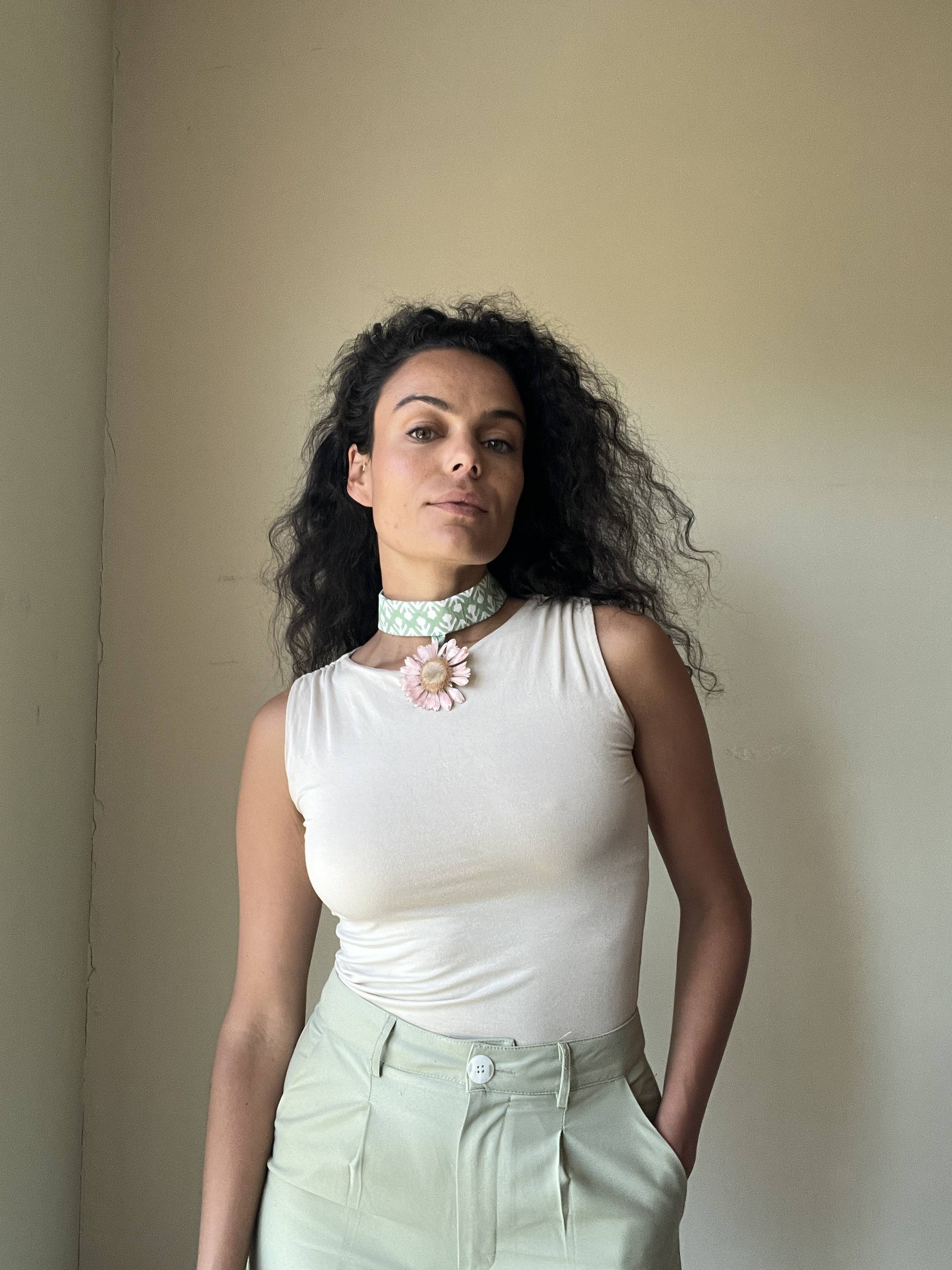 pink gerbara choker on pastel green choker