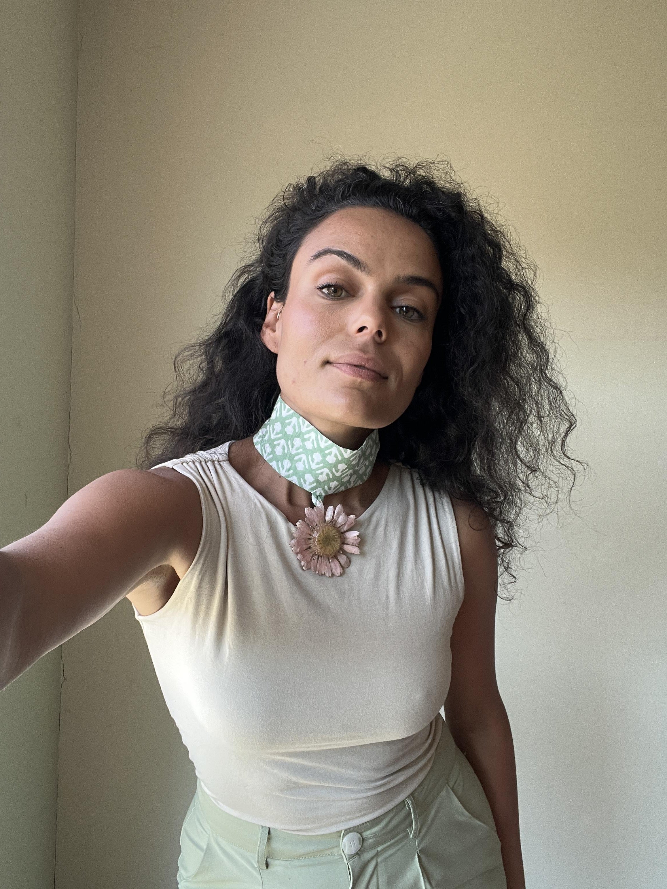 pink gerbara choker on pastel green choker